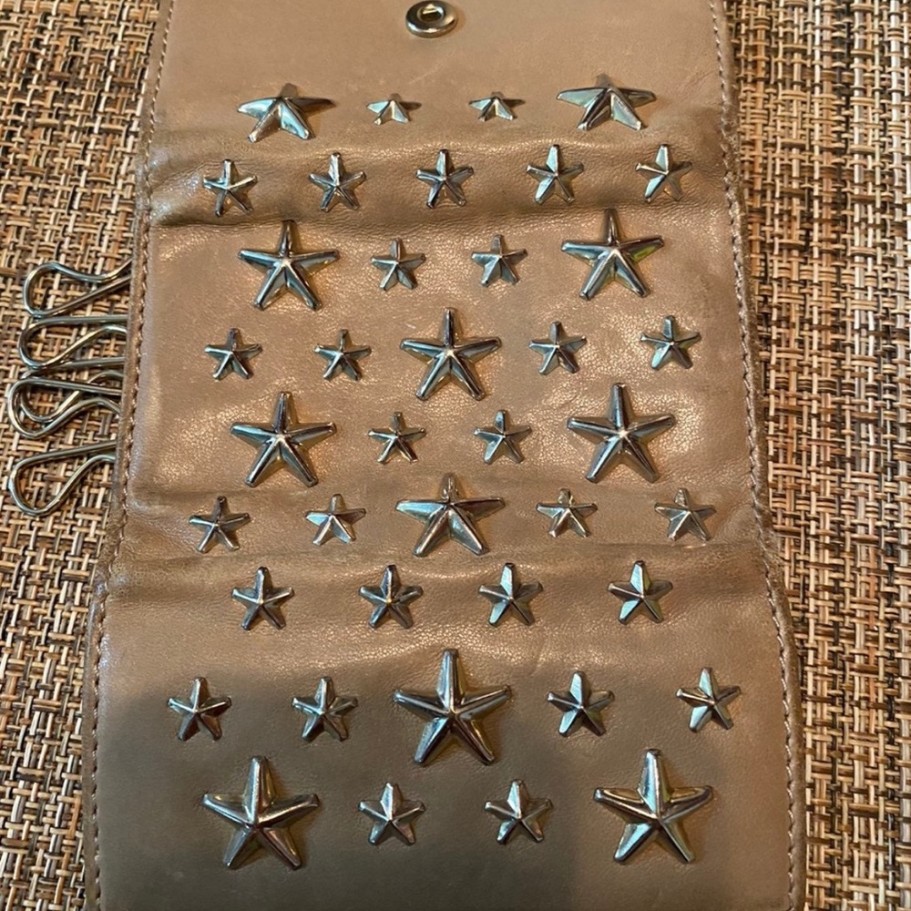 Authentic preowned tan Jimmy Choo key wallet. Good condition.